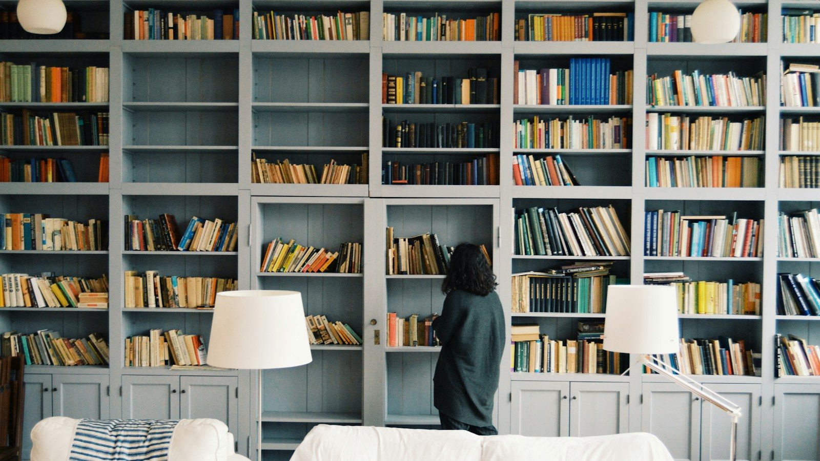 woman finding some book to read